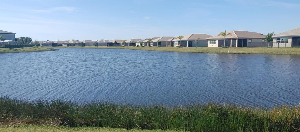 Photo of 11694 SW River Crossing Place, Port Saint Lucie, FL 34987 (MLS # R10953151)