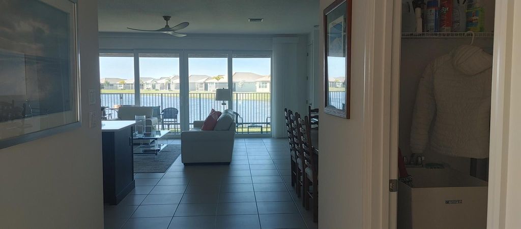 Photo of 11694 SW River Crossing Place, Port Saint Lucie, FL 34987 (MLS # R10953151)