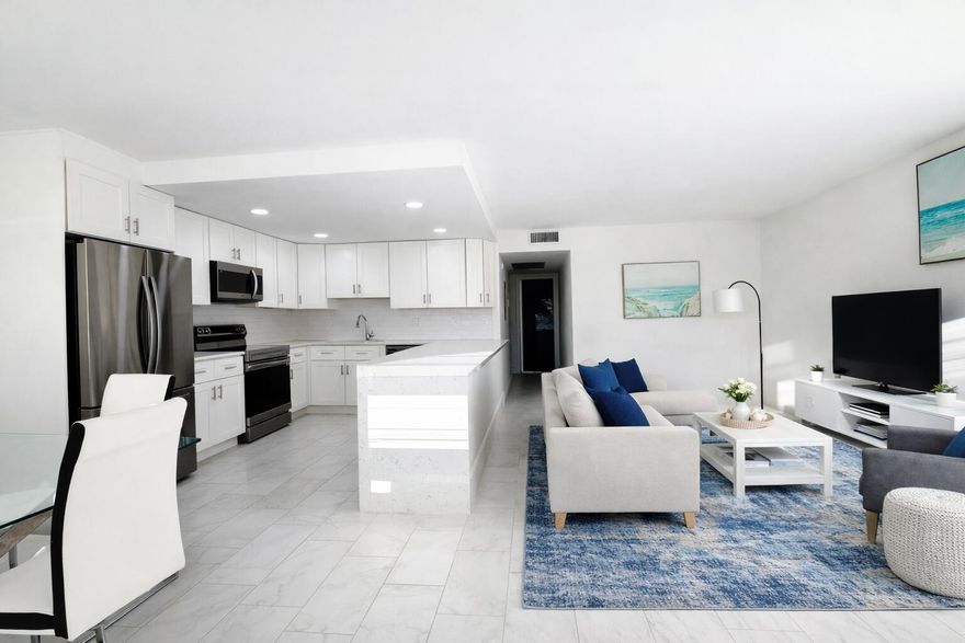 Magnificent renovated 2-bedroom, 2-bath apartment featuring an open-concept layout with quartz countertops, stainless steel appliances, and porcelain tile throughout the living areas. Both bathrooms have been beautifully updated.

Enjoy a screened patio with an open view -- just bring your furniture and start enjoying the magnificent lifestyle at Century Village!

Amenities include internet and WiFi, fitness center, live shows, movies, courtesy buses, classes, bingo, card rooms, trips, tennis courts, and more. Century Village offers true resort-style living, conveniently located near shopping and restaurants.

Come see the unit -- then visit the clubhouse to experience everything this community has to offer!

Per association: 55+ community.