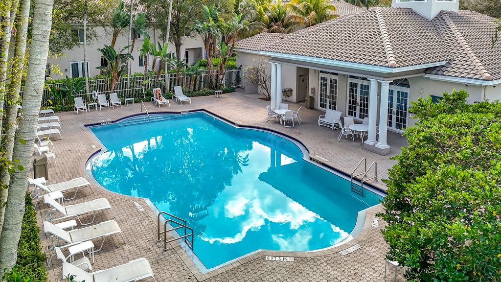 Photo of 4702 NW 59th Manor, Coconut Creek, FL 33073 (MLS # B26019593)