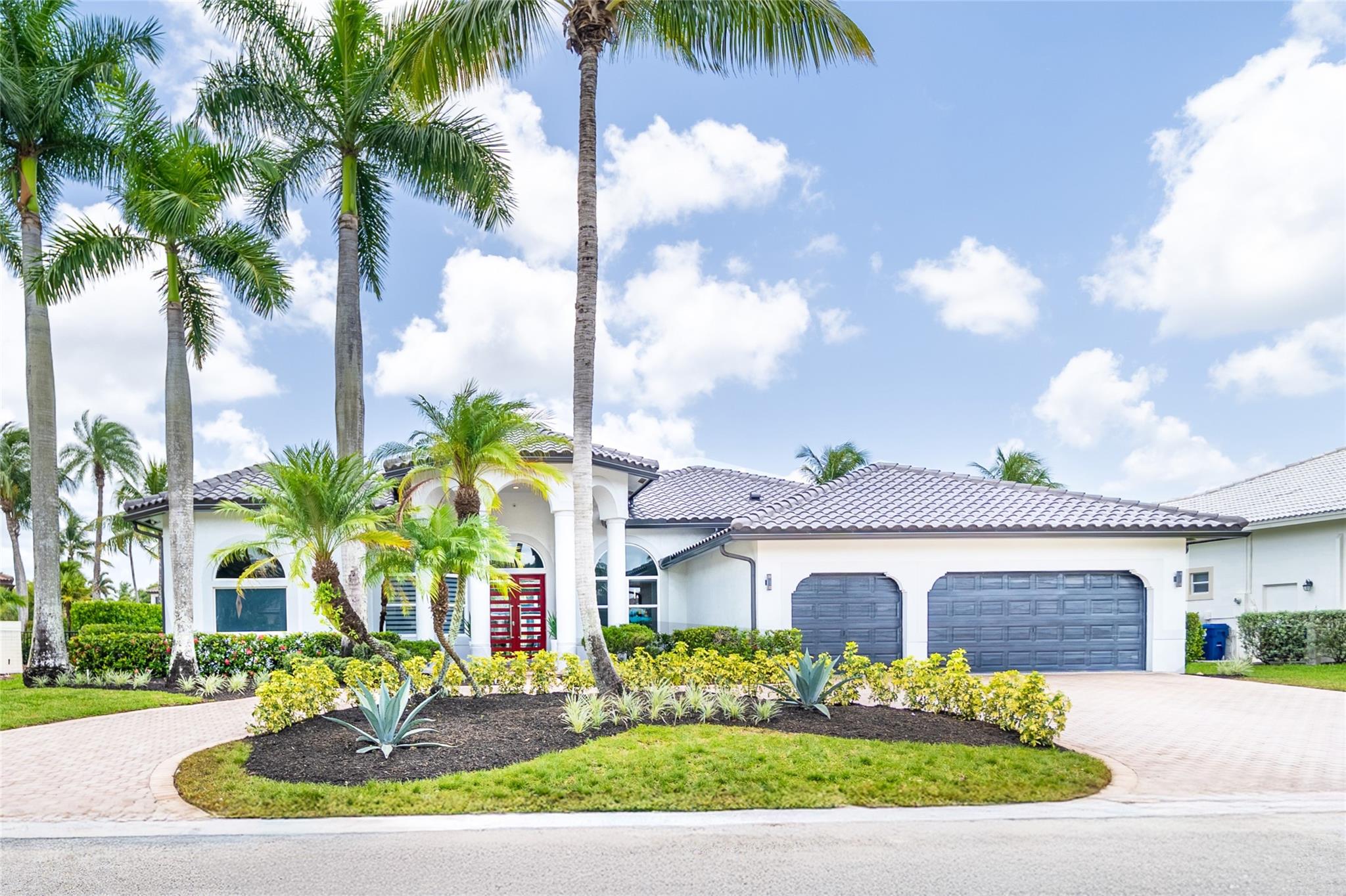 Discover this spacious, well-kept 4-bedroom + office, 3.5-bath home in the quiet and highly
desirable community, The Isles East. With 3,278sqft of living space, this open concept home is
filled with natural light, modern finishes & serene water view. Primary bedroom offers two large
walk-in closets, and each additional bedroom features its own walk-in closet. Recent
improvements include new flooring, a refreshed kitchen, impact windows and doors & AC unit.
New roof (2025) with a 2nd water-resistant layer for enhanced protection/potential insurance
savings. The upgraded 3-car garage features a sleek coated floor. Smart home
connectivity/video surveillance adds security and convenience. Private pool area overlooking a
peaceful canal. Zoned for high-rated schools. No rentals per HOA.