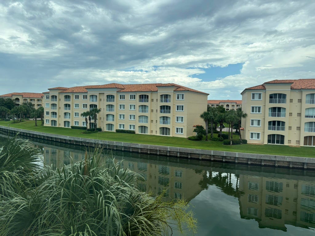 Photo of 7 HARBOUR ISLE Drive E #304, Fort Pierce, FL 34949 (MLS # B26065391)