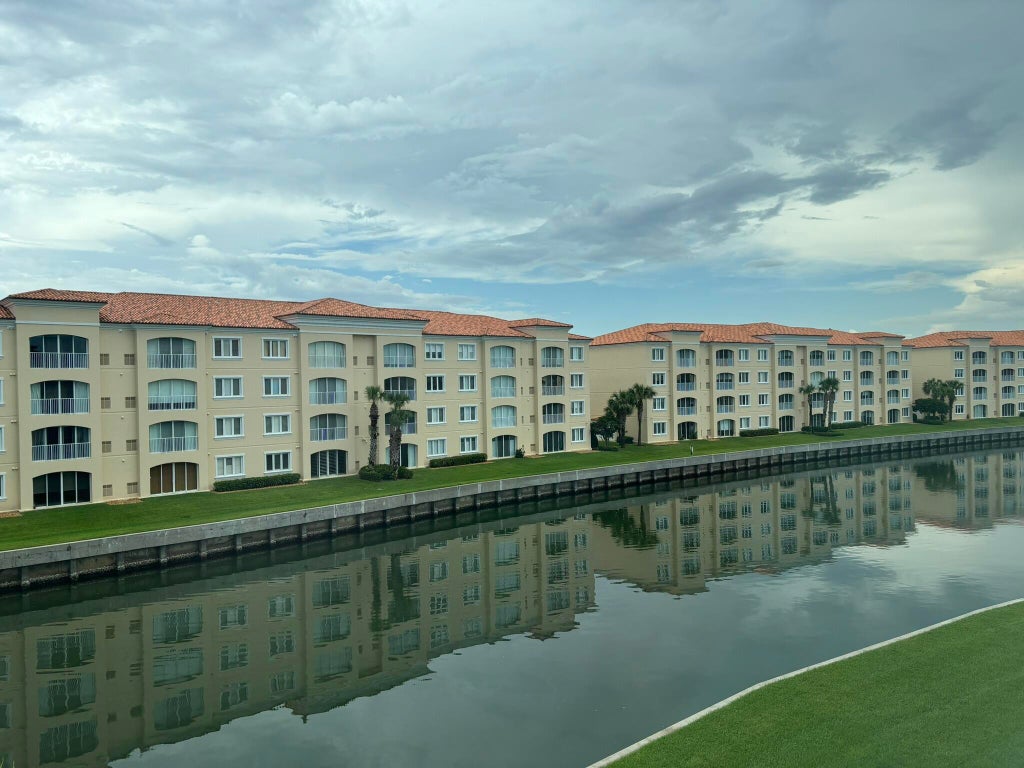 Photo of 7 HARBOUR ISLE Drive E #304, Fort Pierce, FL 34949 (MLS # B26065391)