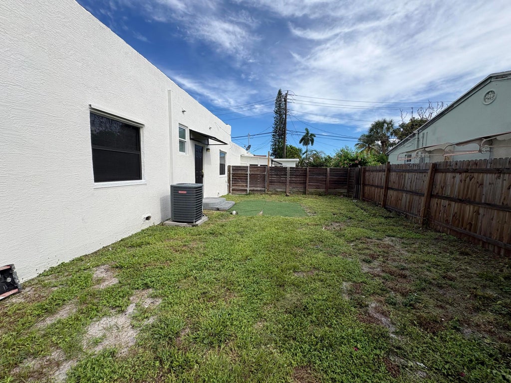 Photo of 445 Maddock Street, West Palm Beach, FL 33405 (MLS # B26079581)