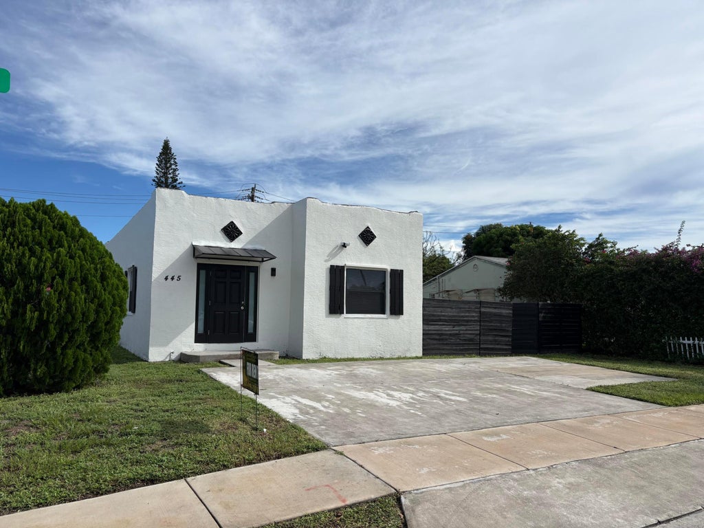Photo of 445 Maddock Street, West Palm Beach, FL 33405 (MLS # B26079581)