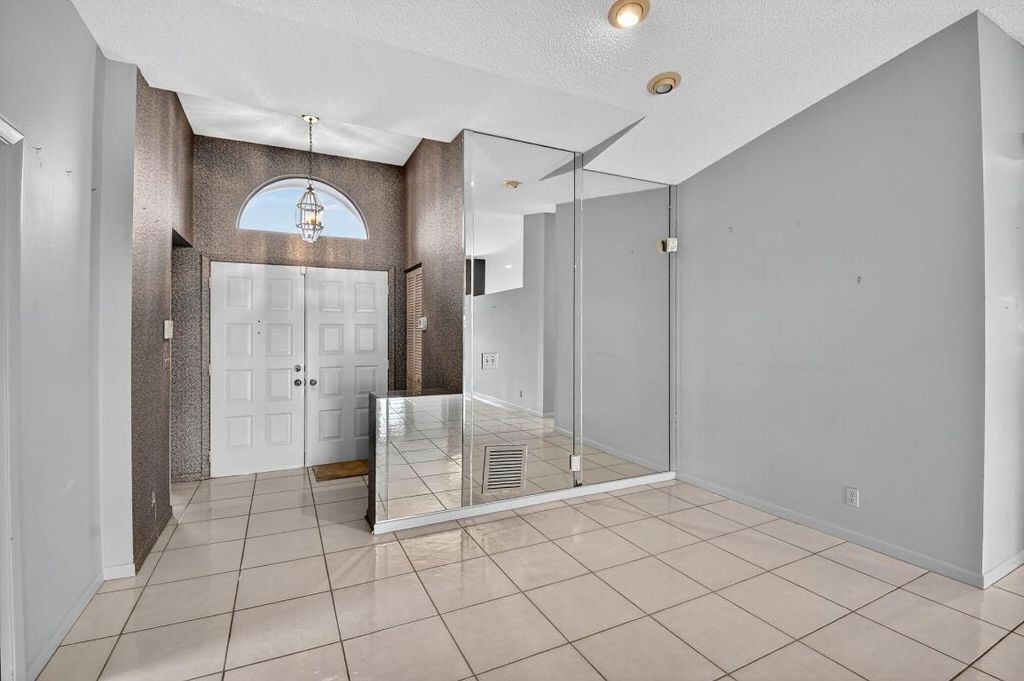 Photo of 8820 Boatswain Drive, Boynton Beach, FL 33436 (MLS # R11119176)