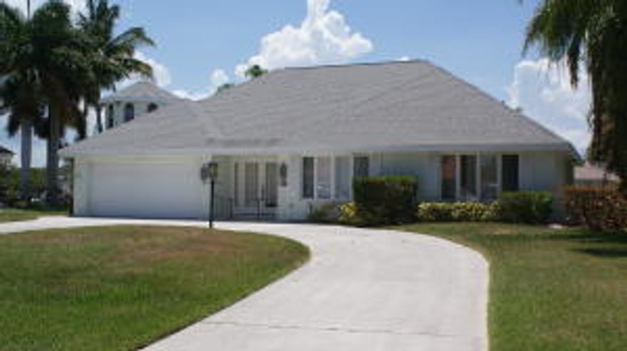 135  FOOT OF SEAWALL WITH PRIVATE DOCK!!!  This is what you have been waiting for.  Spacious open home with vaulted ceilings.  This home has been well loved and enjoyed.  Now it is your turn to turn it back to its glory days.  Structure and roof are sound, but it is mostly still original.  Bring your decorating ideas and make this home yours.  CBS, roof 2004, AC replaced in 2014, 135 foot of seawall. plenty of water at the dock, easy ocean access.  If you are looking for a waterfront home at a great price this is your opportunity.