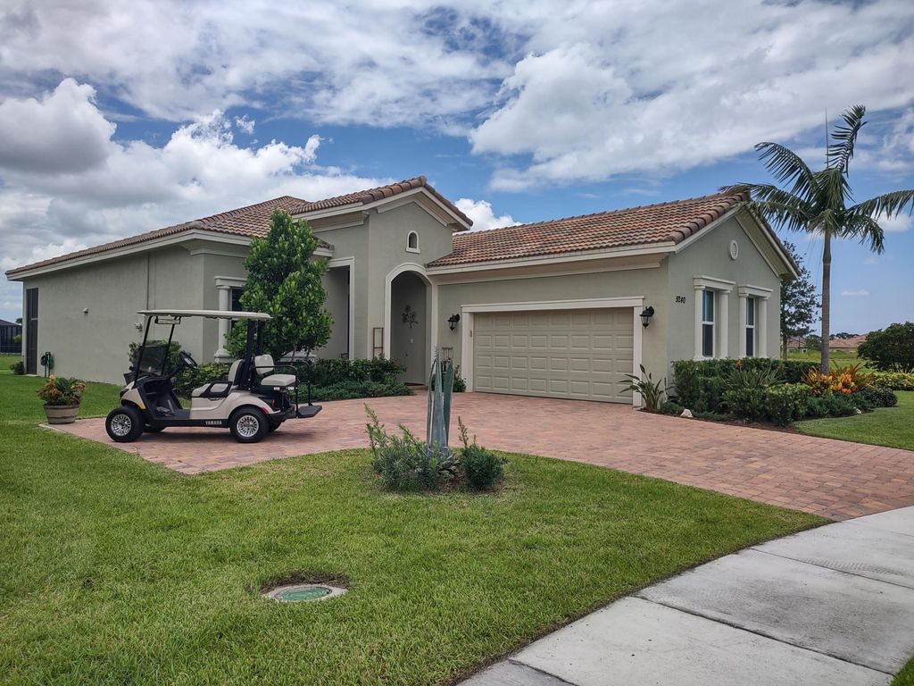 Photo of 9240 SW Miracoli Way, Port Saint Lucie, FL 34987 (MLS # R11039555)