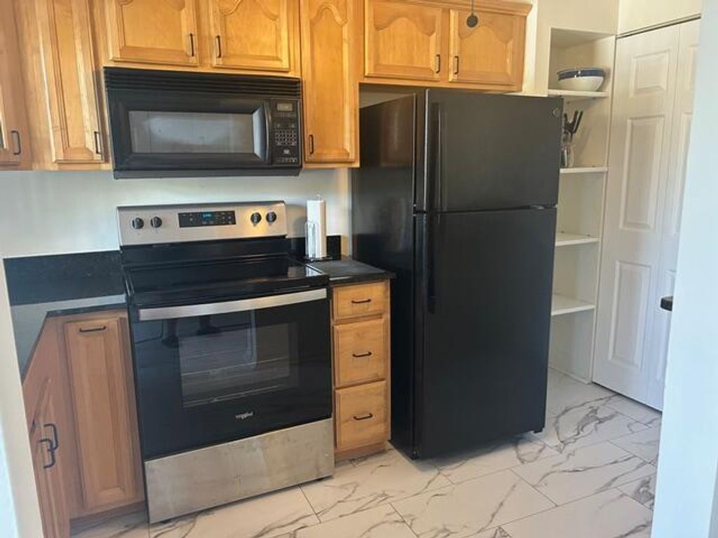 Photo of 10180 NW 30th Court #110, Sunrise, FL 33322 (MLS # B26016598)