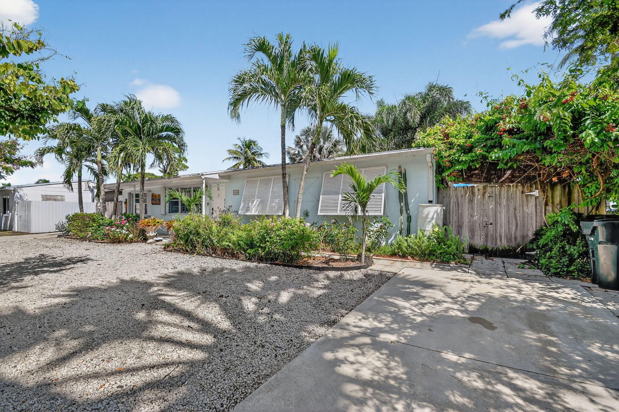 Turnkey 3-Bed, 2-Bath| No HOA|  Outdoor Kitchen| Bonus room| Fenced Yard | Solar Panels| 8 vehicles Parking.Charming home where timeless elegance meets everyday comfort. Open floor plan, spacious kitchen with stainless steel appliances and a large eat-in area. The 24' x 14' bonus room off the living room offers a flexible space perfect for an office or media room. Restoration Hardware sophisticated furniture Included, if desired! CBS home powered by solar panels, average $40/month in electricity costs. Enjoy a covered outdoor kitchen, fully fenced backyard with fruit trees, space for RV or boat and a 10' x 10' utility shed. 4 min to 95, 8 min to the beach, 12 min to Downtown. Watch sunsets just a short walk away at Lake Osborne & John Prince Park.