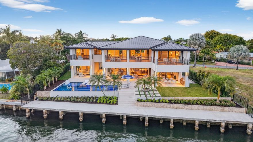 Located on one of the finest direct intracoastal Isles overlooking Birch State Park! Perfectly positioned, almost 16,000 sf property & 100ft of water frontage. Spectacular wide open intracoastal views mesmerize from virtually every room of superior collaboration Architect Bob Tuthill/custom builder JL LaVallee/designer Alex Thies. Almost 2,300 sf covered outdoor living areas & balconies perfectly blend exceptional floorplan, separate private guest house, 5 air conditioned garage bays + large gated motor court. Custom amenities: Lutron technology, Lennox air conditioners, ultimate chef's kitchen & pantry, SubZero/Wolf appliances, wine room, expansive living areas, mudroom, private primary suite, spa style bath, walk-in closets, home office & balcony, upstairs club/media/game room. CO 12/25. - Residence is surrounded by multiple outdoor entertaining areas (2,232 ssf of covered outdoor living areas) comprising rear terraces & expansive covered balconies for the second level family room, primary suite and bedroom suites 2 and 3.- 5 air conditioned garages, 3 in main residence & 2 incorporated into the guest house with gated motor court, great for privacy, security or children's play area. Two separate, dedicated driveways.- Private guest house is separated by the picturesque breeze way adding to the island and coastal modern ambiance of this exceptional residence.- Heated salt water pool with beach ledge (extending 21 ft wide) and 8x6 ft spa.- Covered rear terrace adjoins the dining and living areas, complete with hidden rolldown hurricane screens & drop down TV.- Separate dedicated home office (not included in the bedrooms) also features a private balcony.