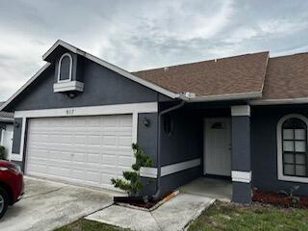 Photo of 917 SE Streamlet Avenue SE, Port Saint Lucie, FL 34983 (MLS # R11105301)