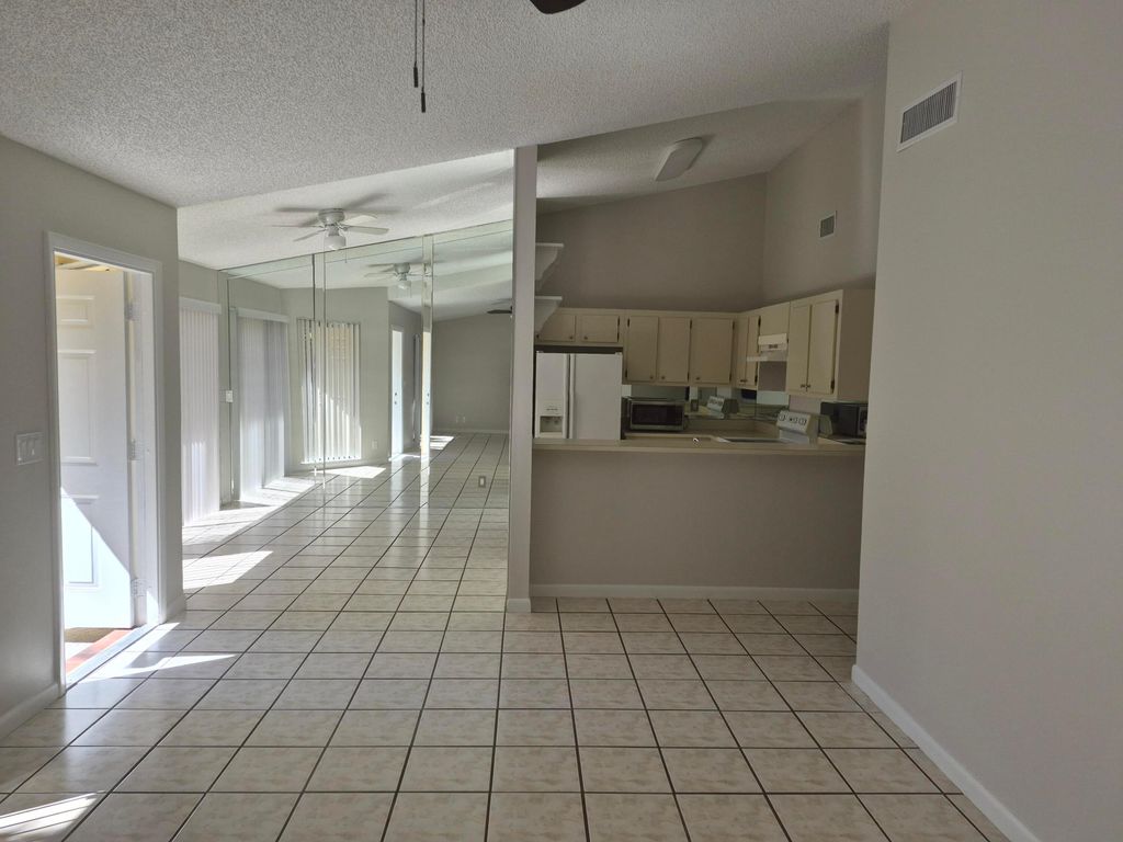 Photo of 394 Springdale Circle, Palm Springs, FL 33461 (MLS # R11166510)