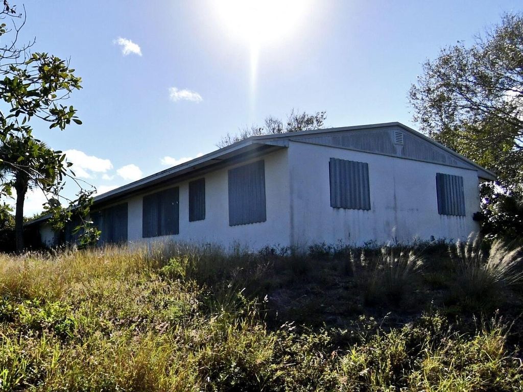 Photo of 201 Julian Drive, Fort Pierce, FL 34946 (MLS # R10899277)