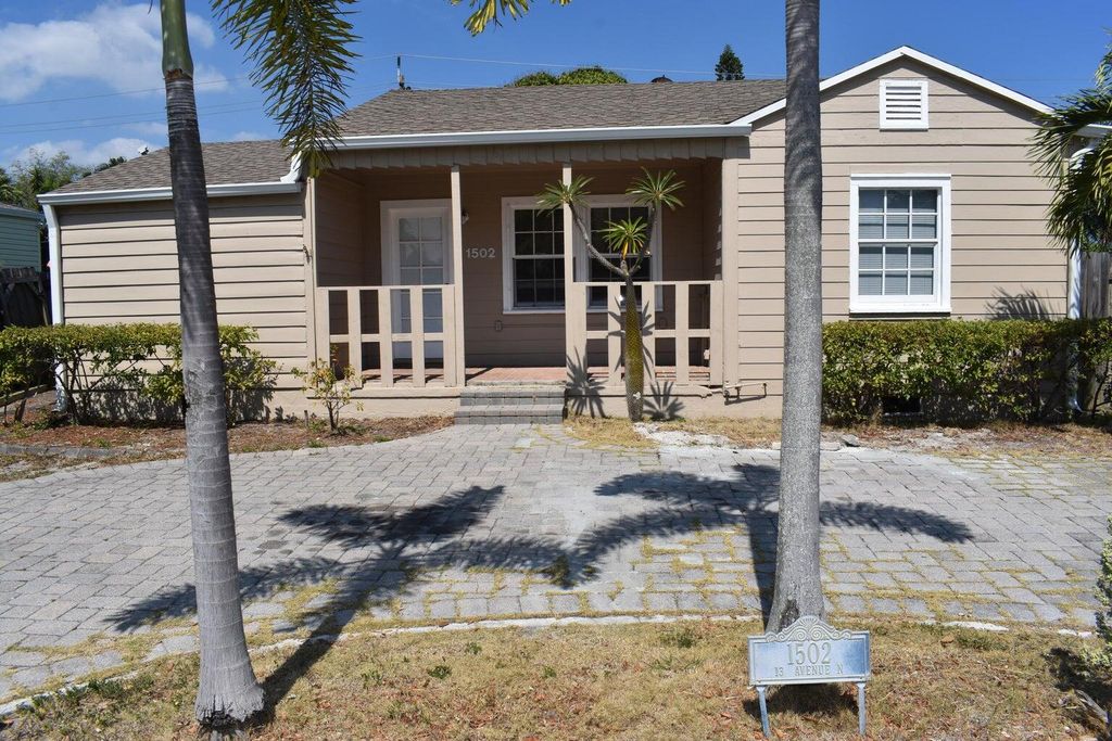Photo of 1502 13th Avenue N, Lake Worth Beach, FL 33460 (MLS # R10981063)