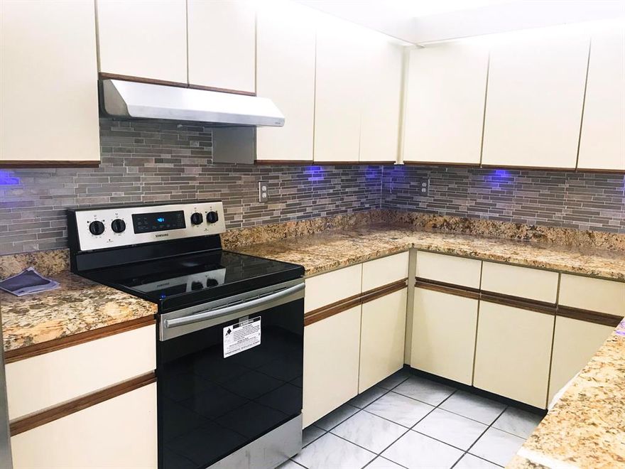 First time buyers dream!!  This 3 bedroom 2 bathroom has many new features.  The showers/bathtub are newly tiled, the kitchen has new appliances, new granite countertop along with a new back splash.  The high vaulted ceilings give this villa a spacious feel.  This charming unit is tucked into a quiet area of the community. The villa has been freshly painted a modern white gray with brand new gutters. Soon to be a gated community.  A perfect space for entertaining and to call home.