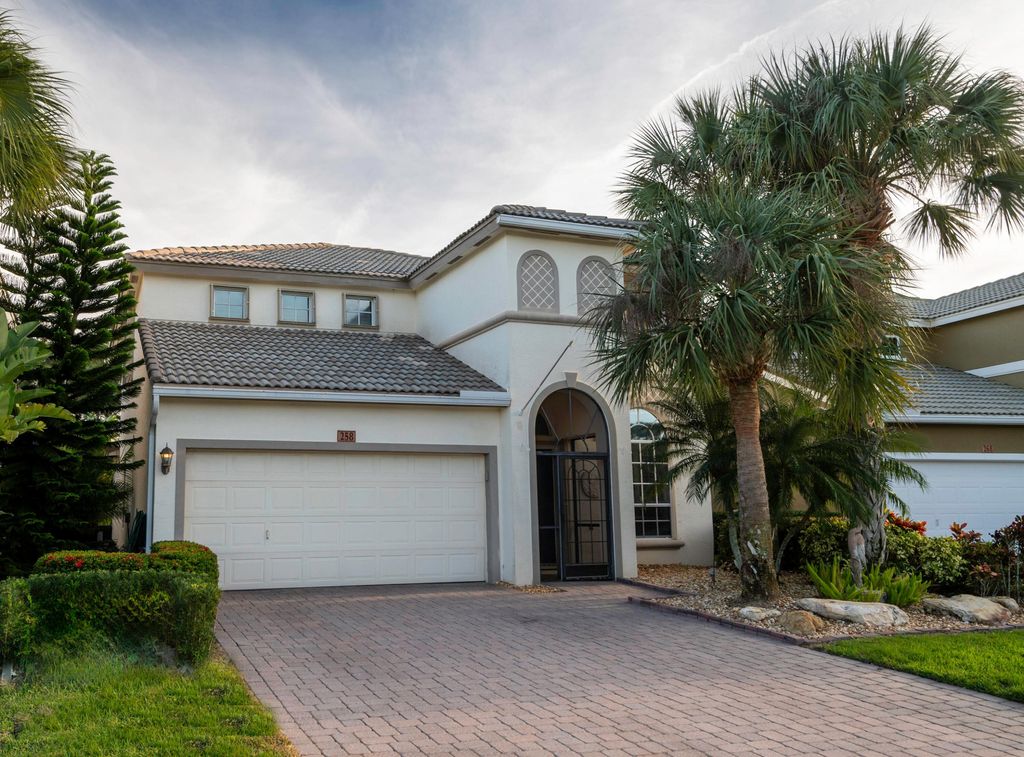Photo of 258 NW Red Cedar Street, Jensen Beach, FL 34957 (MLS # R10956853)