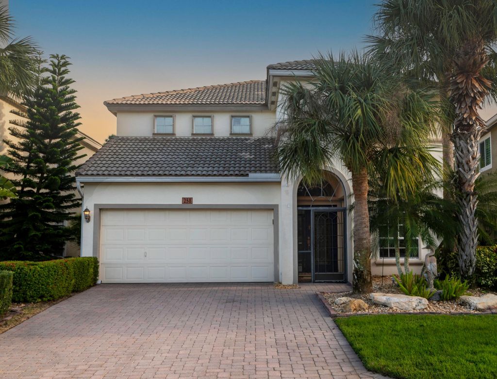 Photo of 258 NW Red Cedar Street, Jensen Beach, FL 34957 (MLS # R10956853)