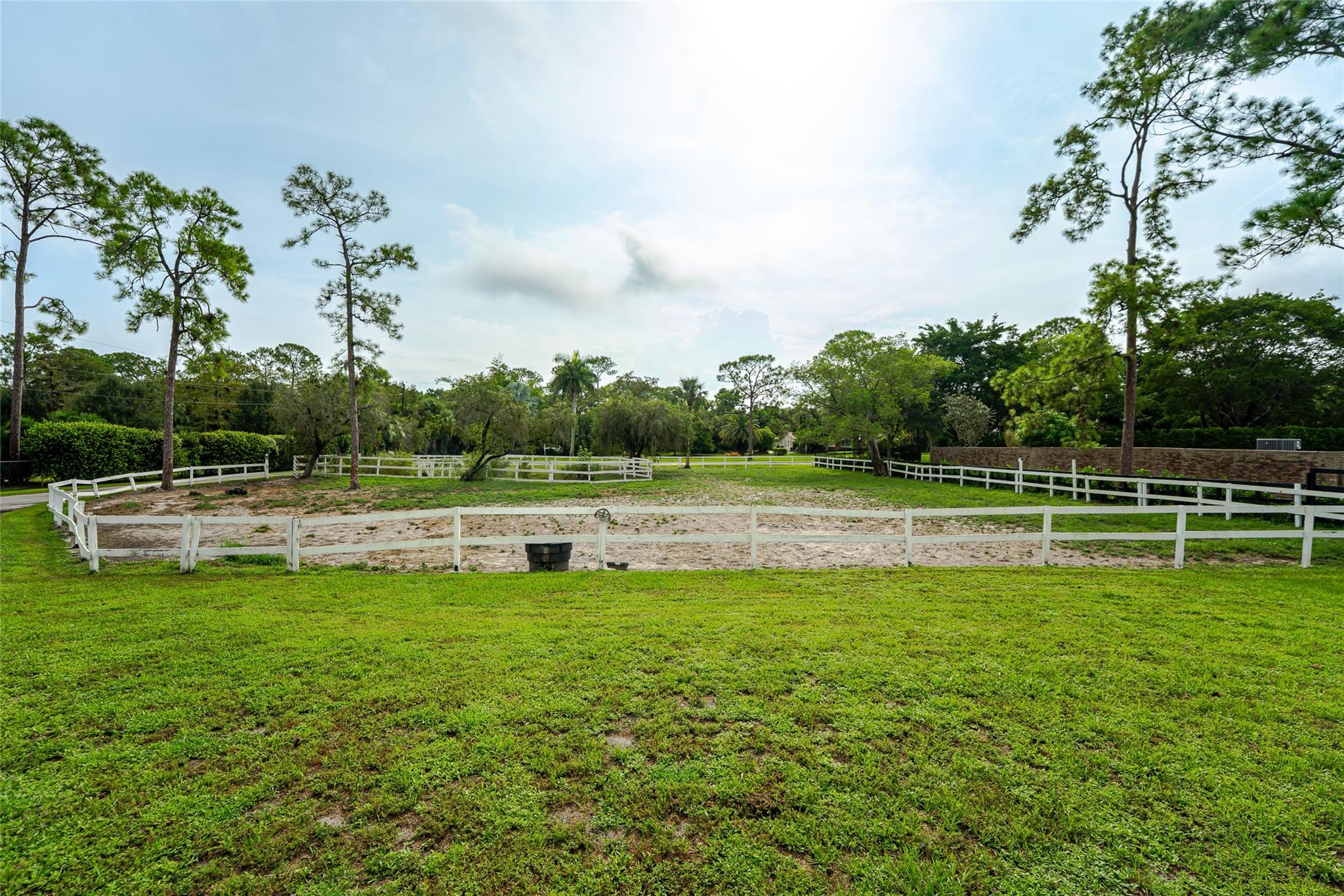 INVESTOR/BUILDER OPPORTUNITY******* PRICE IS BASED ON PREMIUM 2.5 ACRE LOT OF EQUESTRIAN/AGRICULTURAL LAND IN PARKLAND*****THERE ARE 5 HORSE STALLS WITH A WARRANTY STILL IN PLACE. ******* The home has newer roof and A/C. The Olympic size pool and home has issues and needs work. *******Buyers in the area are tearing down the existing structure and building large mini mansions.*******