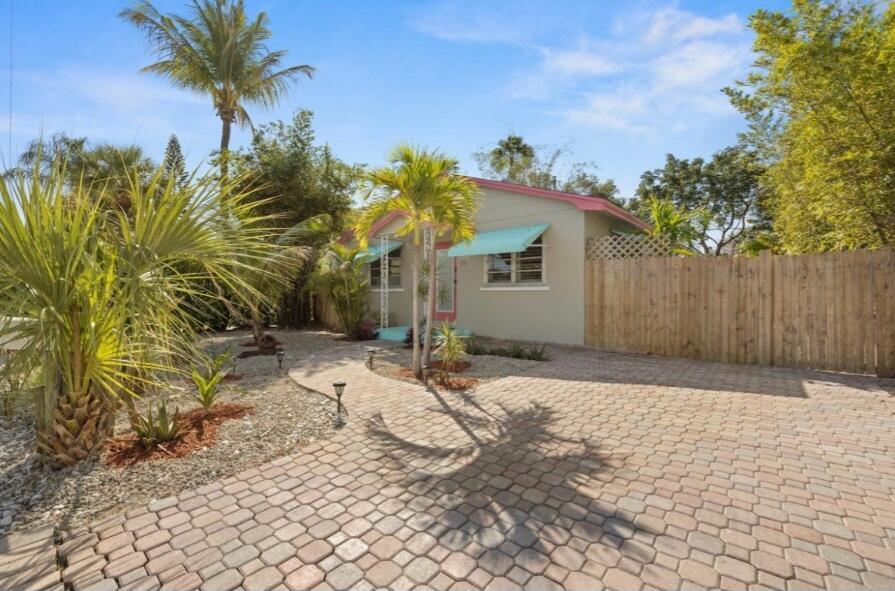 Photo of 101 E 25th Street, West Palm Beach, FL 33404 (MLS # B26082520)