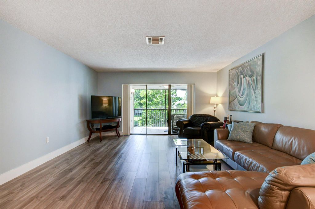 Photo of 48 Stratford Lane W #D, Boynton Beach, FL 33436 (MLS # R11132349)