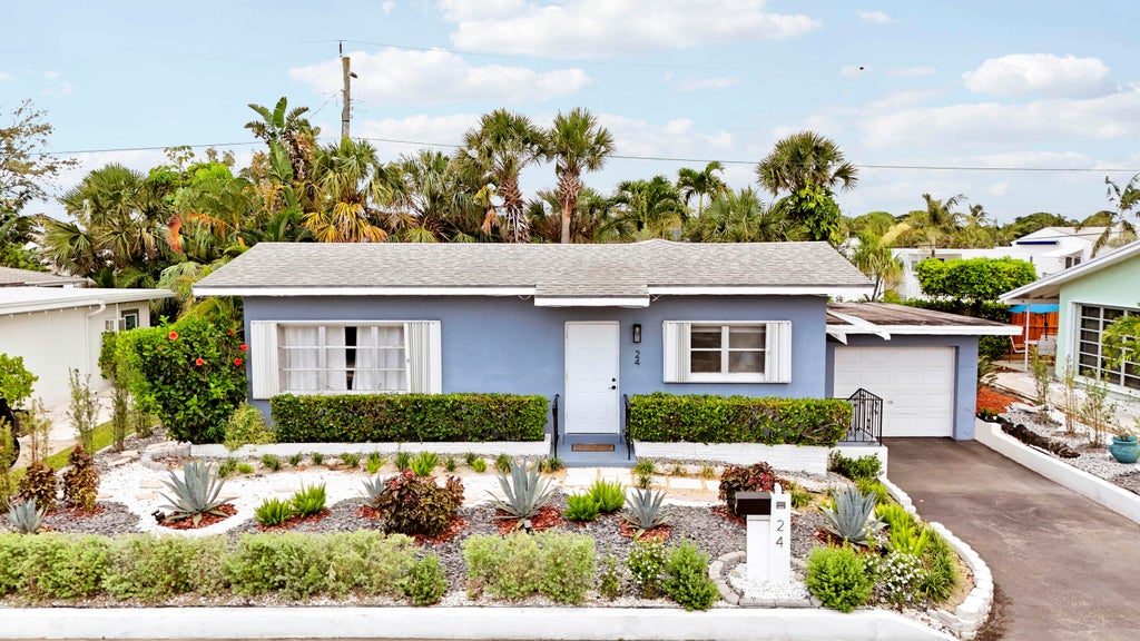 Photo of 24 Douglas Drive, Ocean Ridge, FL 33435 (MLS # B26043462)