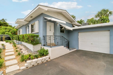 Photo of 24 Douglas Drive, Ocean Ridge, FL 33435 (MLS # B26043462)