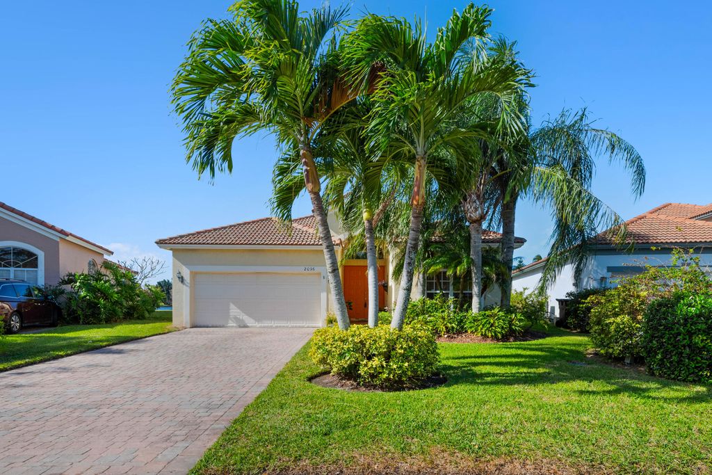 Photo of 2096 NW Marsh Rabbit Lane, Jensen Beach, FL 34957 (MLS # R10958024)