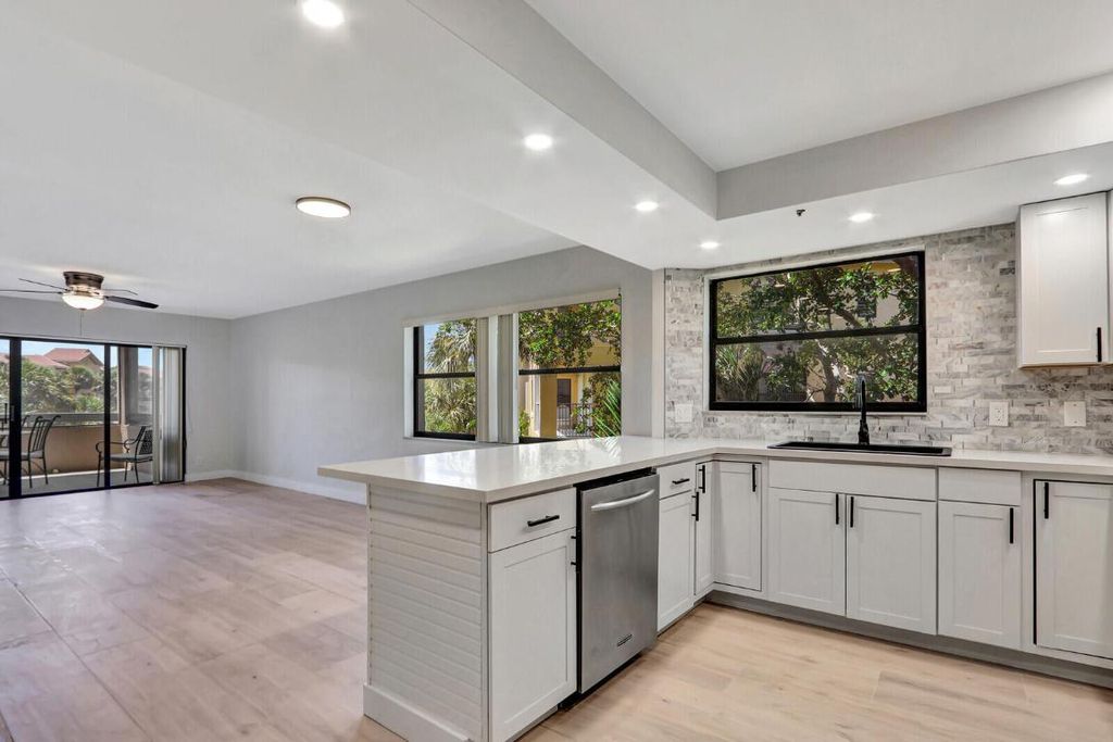 Photo of 700 Uno Lago Drive #301, Juno Beach, FL 33408 (MLS # R11130943)