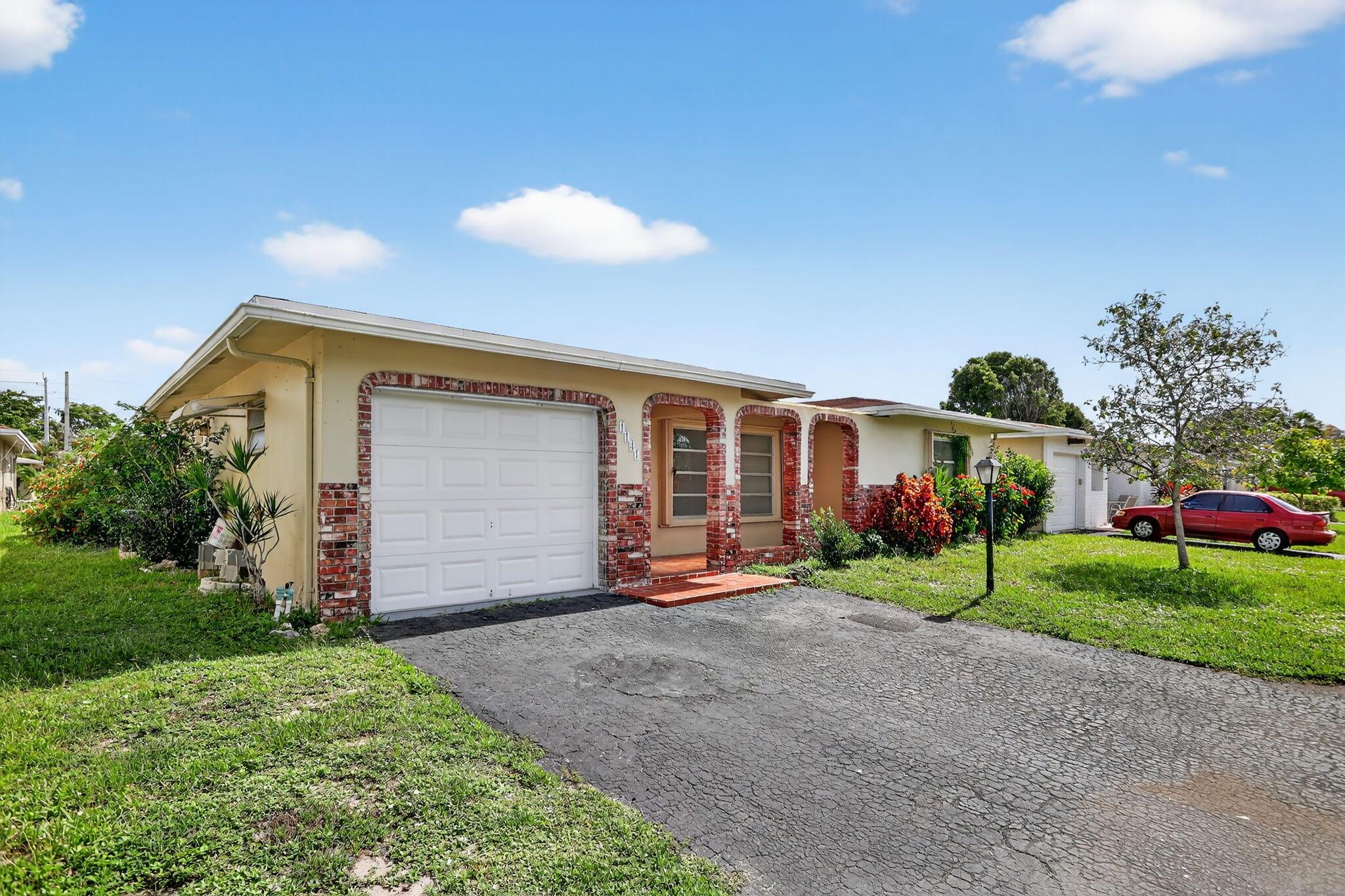 COME AND CHECK OUT THIS NEWLY RENOVATED ALL AGES SINGLE FAMILY HOME!! This home is a huge 2 Bedroom, 2 Bathroom, 1 Car Garage - CBS Home with over 1500 SQFT of living space with a HUGE Family Room that can be converted to a Third Bedroom. This home has complete shutters some windows have Accordion Shutters with others having Colonial Style Shutters. This home has been tastefully renovated with: New Luxury Vinyl Flooring, New SS Appliances, New Granite Countertops, New Kitchen Cabinets, New Washer and Dryer, New LED Lights, New Baseboards, New Paint, Newly Remodeled Bathrooms, New window treatments, and MUCH MUCH MORE.