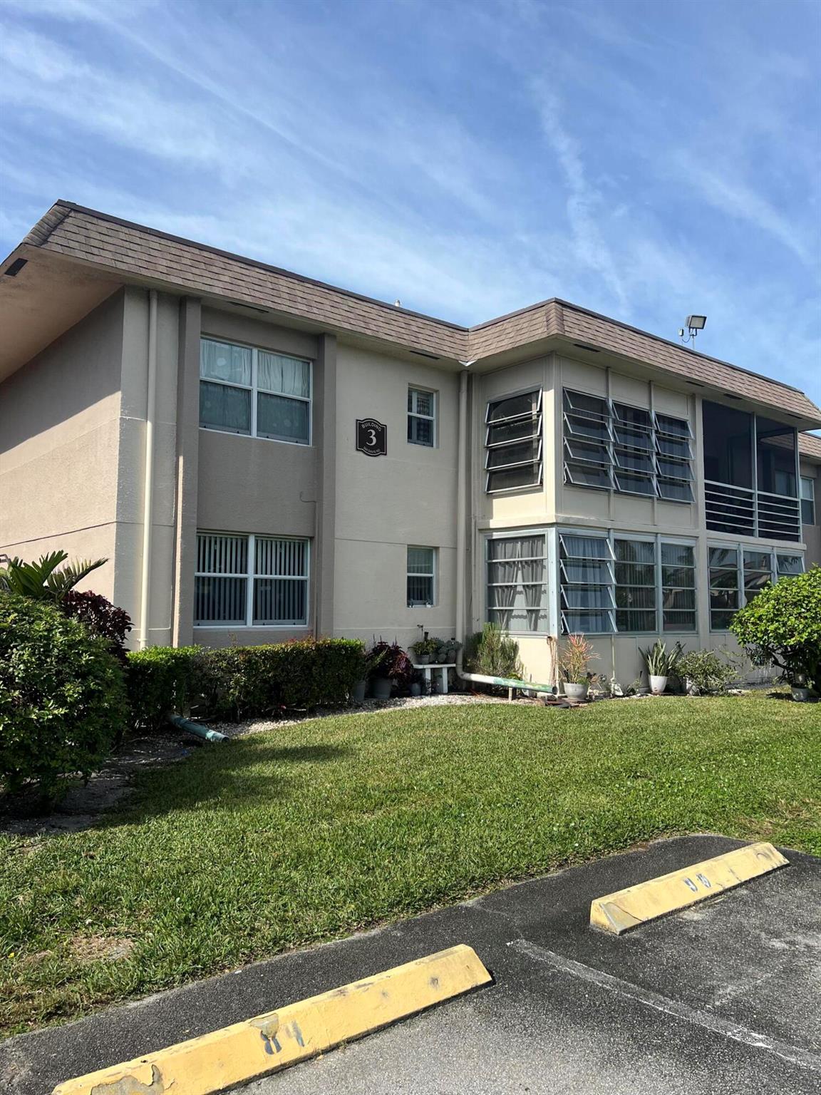 Welcome to this charming 2-bedroom, 2-bathroom condo located on the desirable 1st floor, offering the perfect balance of comfort and convenience. Enjoy peaceful water views of the lake and fountain from the living room, while the front door opens up to a serene garden view. With tile flooring throughout, this home is both stylish and easy to maintain. The second bathroom has been beautifully updated, adding a fresh and modern touch. The vibrant community provides a wealth of amenities to enhance your lifestyle, including a sparkling pool, clubhouse, shuffleboard, and a fun-filled game room. Whether you're relaxing by the water or socializing with neighbors, this condo offers the ideal place to call home. One person must be 55 plus