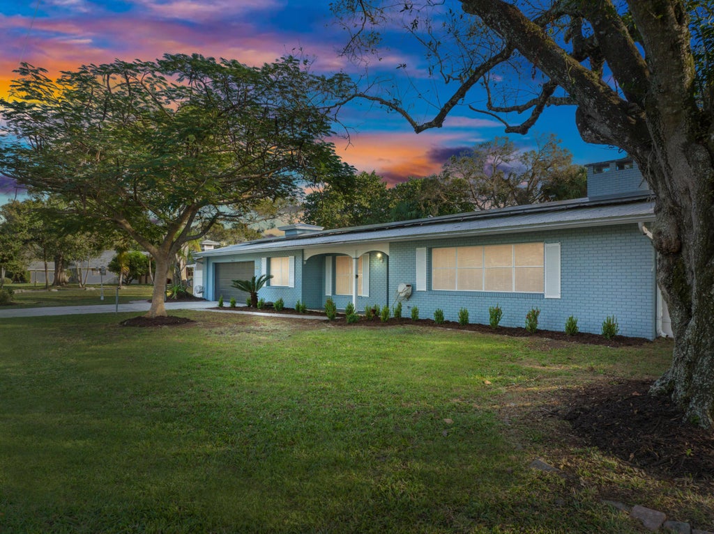 Photo of 4042 Greenwood Drive, Fort Pierce, FL 34982 (MLS # R10940139)
