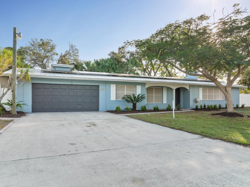 Photo of 4042 Greenwood Drive, Fort Pierce, FL 34982 (MLS # R10940139)