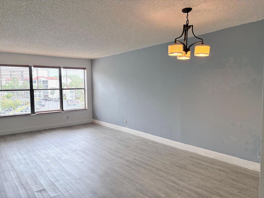 Photo of 2316 S Cypress Bend Drive #318, Pompano Beach, FL 33069 (MLS # B26007927)