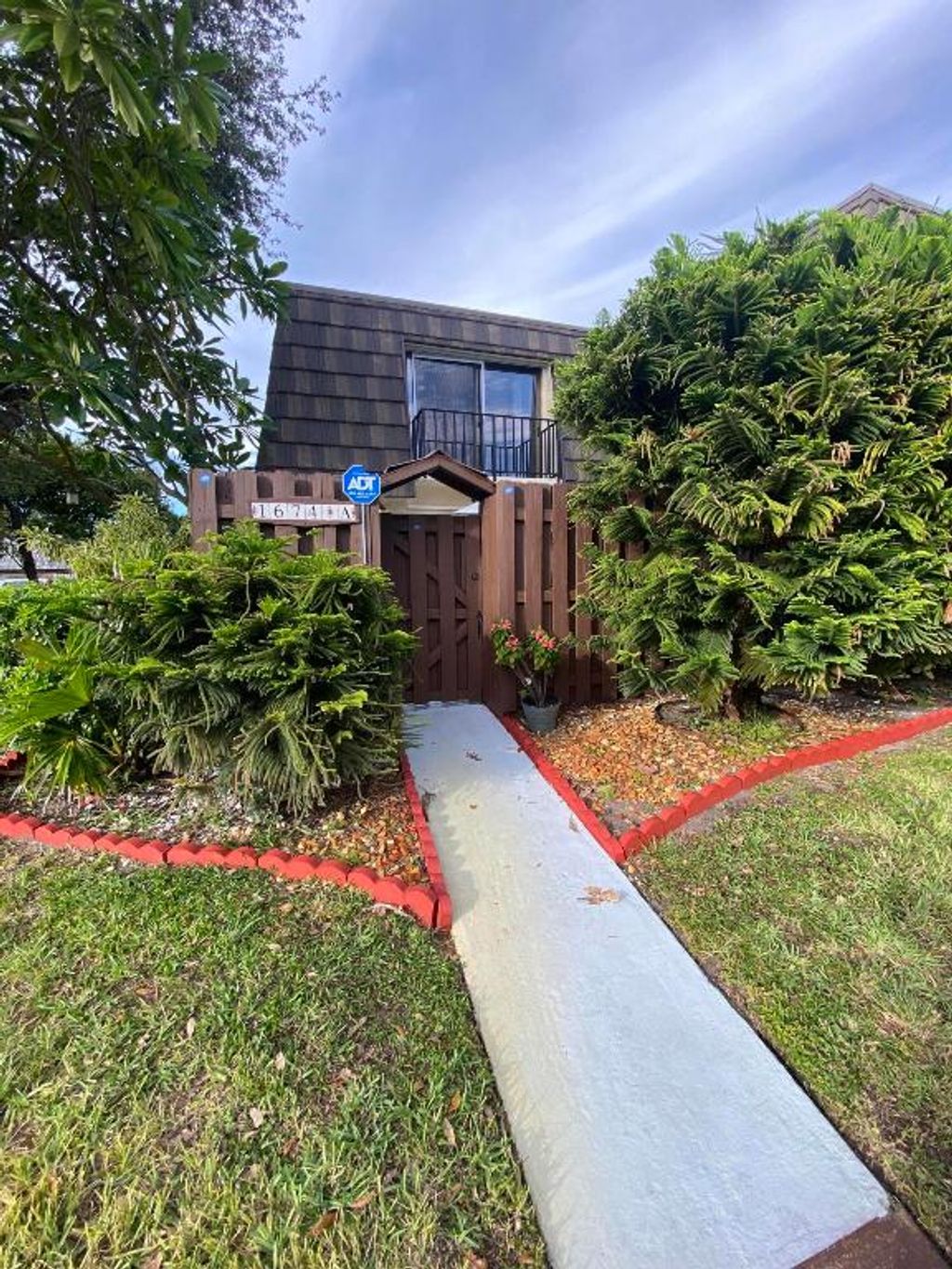 Photo of 1674 Forest Lakes Circle #A, West Palm Beach, FL 33406 (MLS # R11134865)