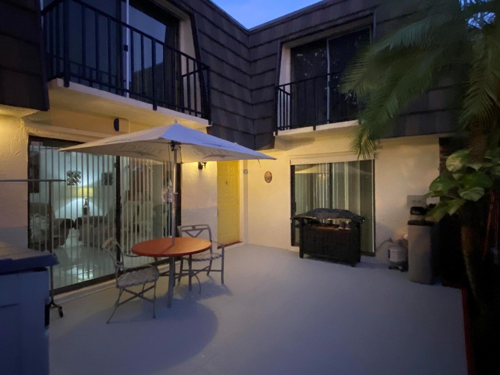 Photo of 1674 Forest Lakes Circle #A, West Palm Beach, FL 33406 (MLS # R11134865)