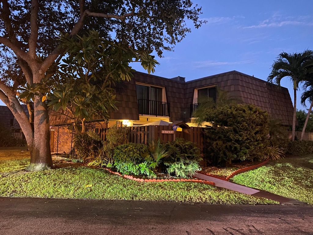 Photo of 1674 Forest Lakes Circle #A, West Palm Beach, FL 33406 (MLS # R11134865)