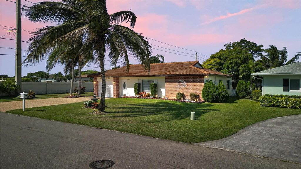 Photo of 6901 NW 95th Terrace, Tamarac, FL 33321 (MLS # B26015879)