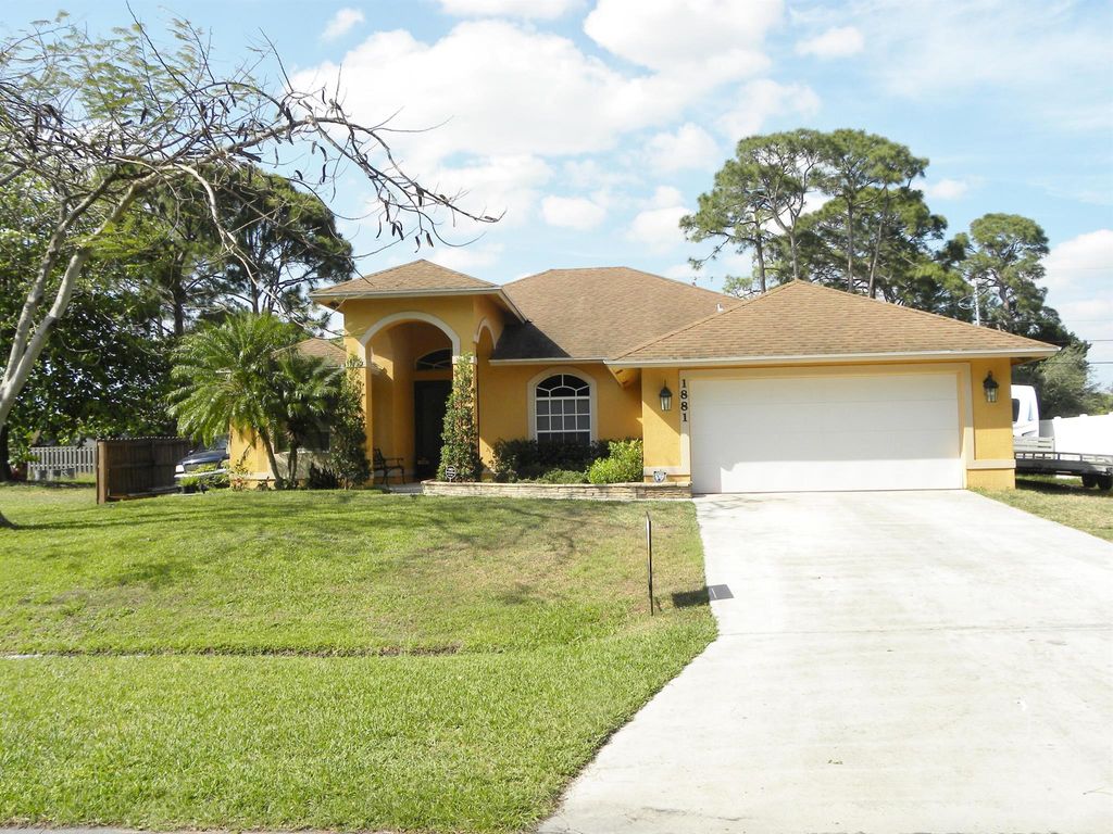 Photo of 1881 SW Michelangelo Avenue, Port Saint Lucie, FL 34984 (MLS # R10970864)