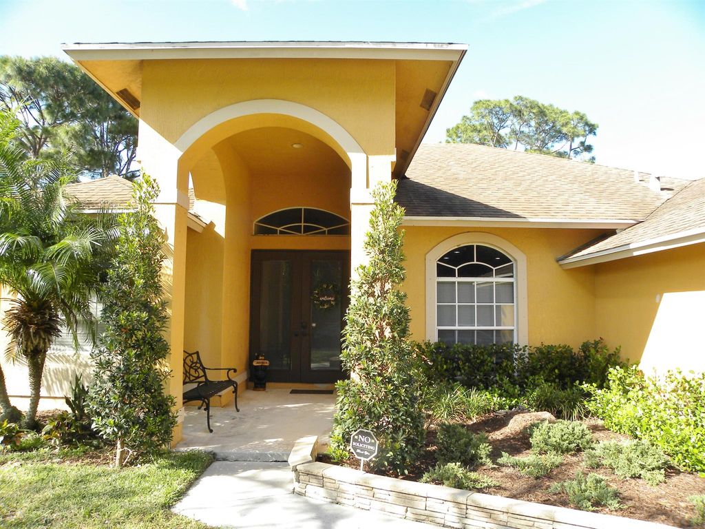 Photo of 1881 SW Michelangelo Avenue, Port Saint Lucie, FL 34984 (MLS # R10970864)