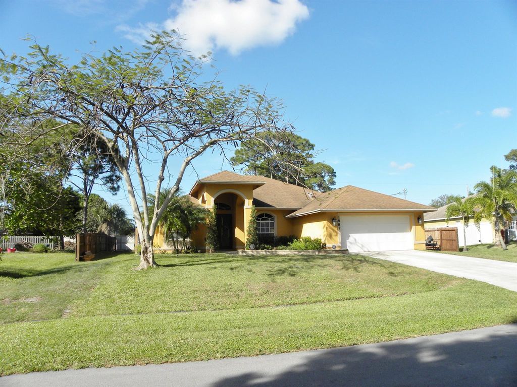 Photo of 1881 SW Michelangelo Avenue, Port Saint Lucie, FL 34984 (MLS # R10970864)