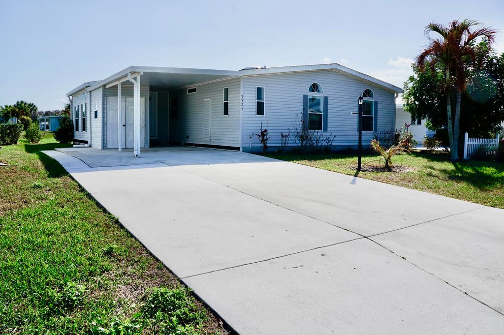 Photo of 3325 Ironwood Ave, Port Saint Lucie, FL 34952 (MLS # B26001163)