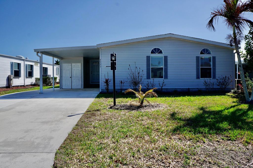 Photo of 3325 Ironwood Ave, Port Saint Lucie, FL 34952 (MLS # B26001163)