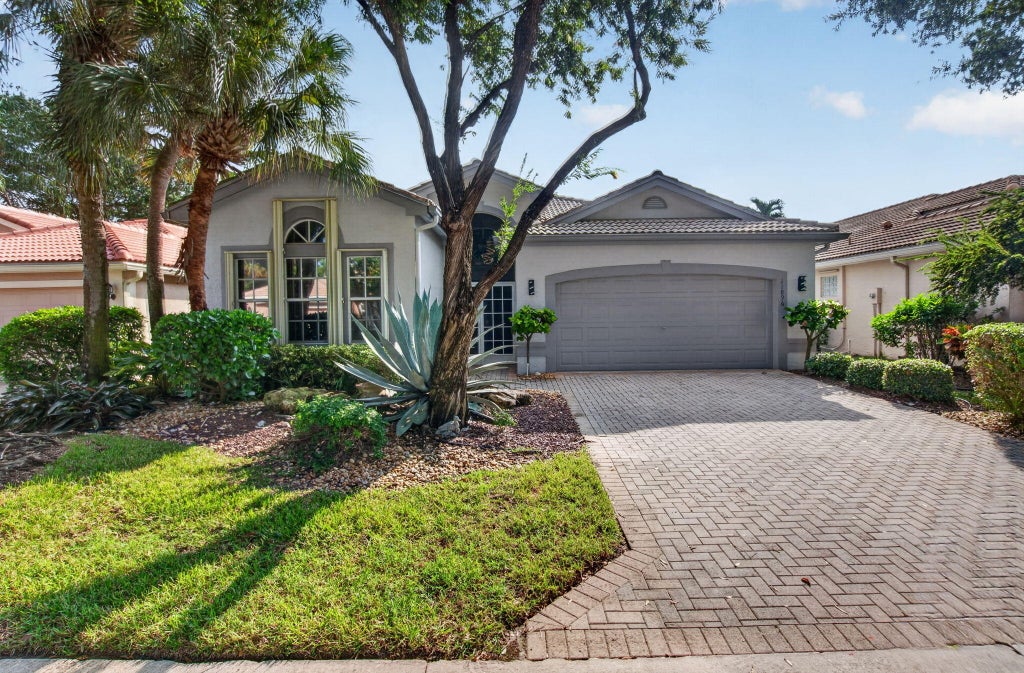 Photo of 11896 MANZANO Avenue, Boynton Beach, FL 33437 (MLS # B26086353)
