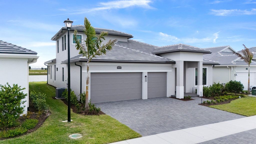 Photo of 12965 SW Leopold Way, Port Saint Lucie, FL 34987 (MLS # B26018408)