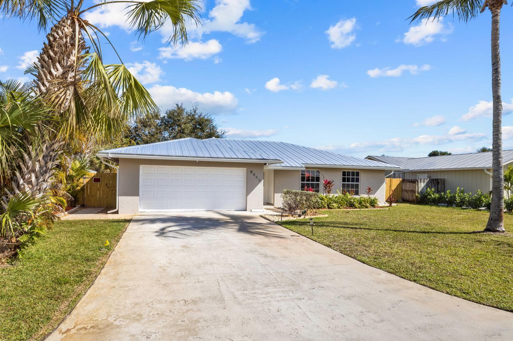 Photo of 8993 SE Sandridge Avenue, Hobe Sound, FL 33455 (MLS # R11163786)