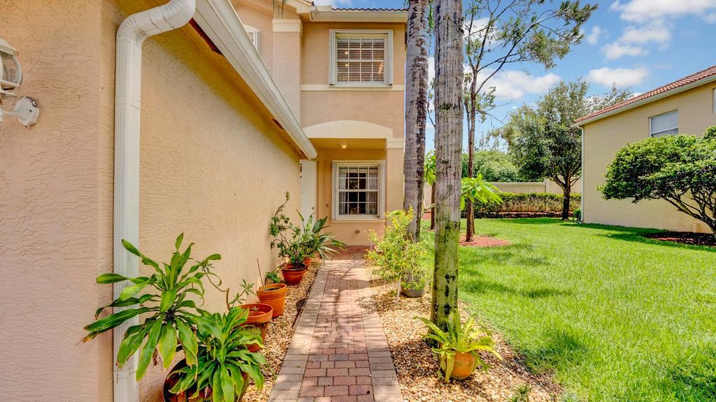Photo of 7938 Jewelwood Dr, Boynton Beach, FL 33437 (MLS # R11147834)