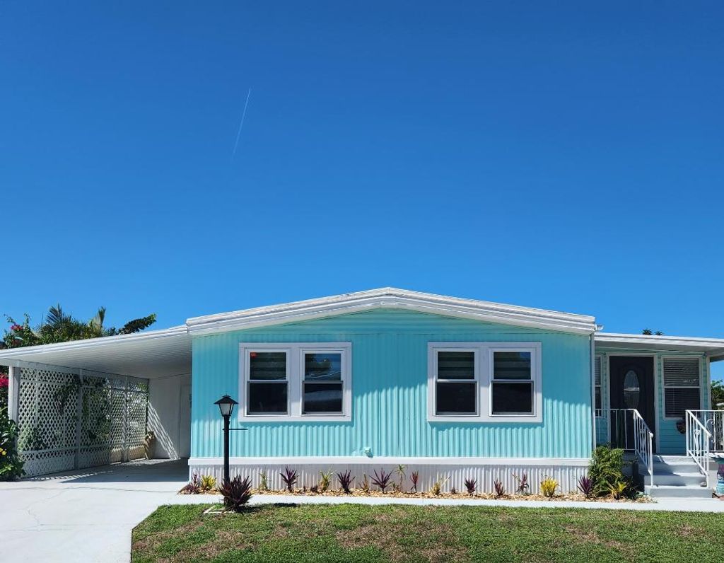 Photo of 162 S Warner Drive, Jensen Beach, FL 34957 (MLS # R11116238)