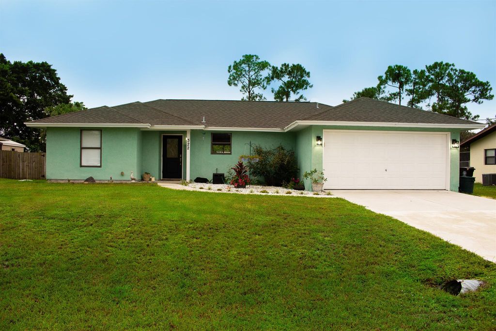 Photo of 322 SE Crosspoint Drive, Port St Lucie, FL 34983 (MLS # R10911437)
