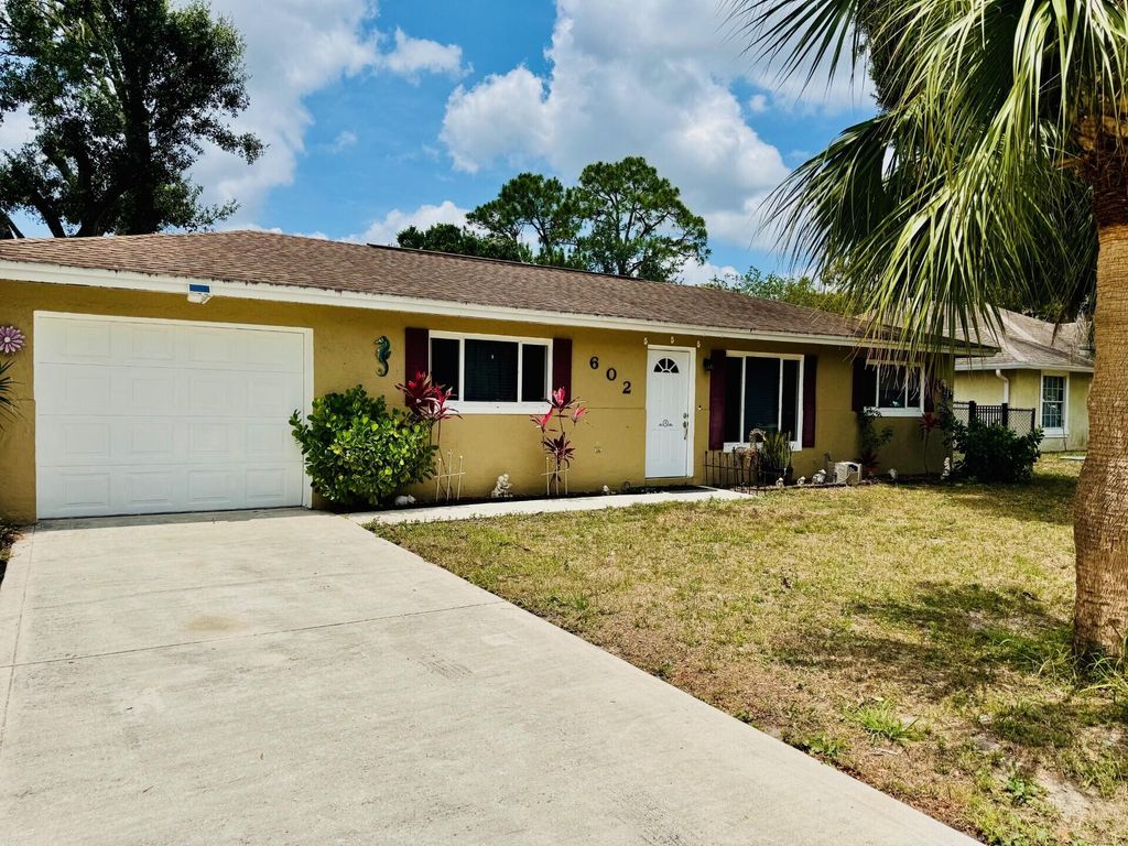 Photo of 602 NW Cardinal Drive, Port Saint Lucie, FL 34983 (MLS # R11077961)